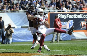 Arizona Cardinals wide receiver Larry Fitzgerald (11) makes a touchdown reception against Chicago Bears inside linebacker Shea McClellin (50) during the second half of an NFL football game, Sunday, Sept. 20, 2015, in Chicago. (AP Photo/David Banks)