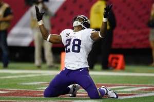 Nov 29, 2015; Atlanta, GA, USA; Minnesota Vikings running back Adrian Peterson (28) reacts after scoring a touchdown against the Atlanta Falcons during the fourth quarter at the Georgia Dome. The Vikings defeated the Falcons 20-10. Mandatory Credit: Dale Zanine-USA TODAY Sports