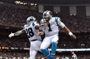 NEW ORLEANS, LA - DECEMBER 06: Cam Newton #1 celebrates a touchdown with Jonathan Stewart #28 of the Carolina Panthers during the second quarter of a game against the New Orleans Saints at the Mercedes-Benz Superdome on December 6, 2015 in New Orleans, Louisiana. (Photo by Stacy Revere/Getty Images)