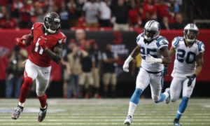 Oct 2, 2016; Atlanta, GA, USA; Atlanta Falcons wide receiver Julio Jones (11) runs for a touchdown against Carolina Panthers cornerback Bene