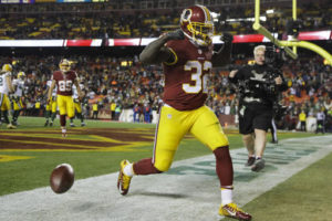 Washington Redskins running back Rob Kelley (32) celebrates his touchdown during the second half of an NFL football game against the Green Bay Packers in Landover, Md., Sunday, Nov. 20, 2016. The Redskins defeated the Packer 42-24. (AP Photo/Patrick Semansky)